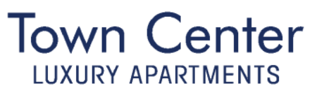 A sign that says Town Center Luxury Apartments.